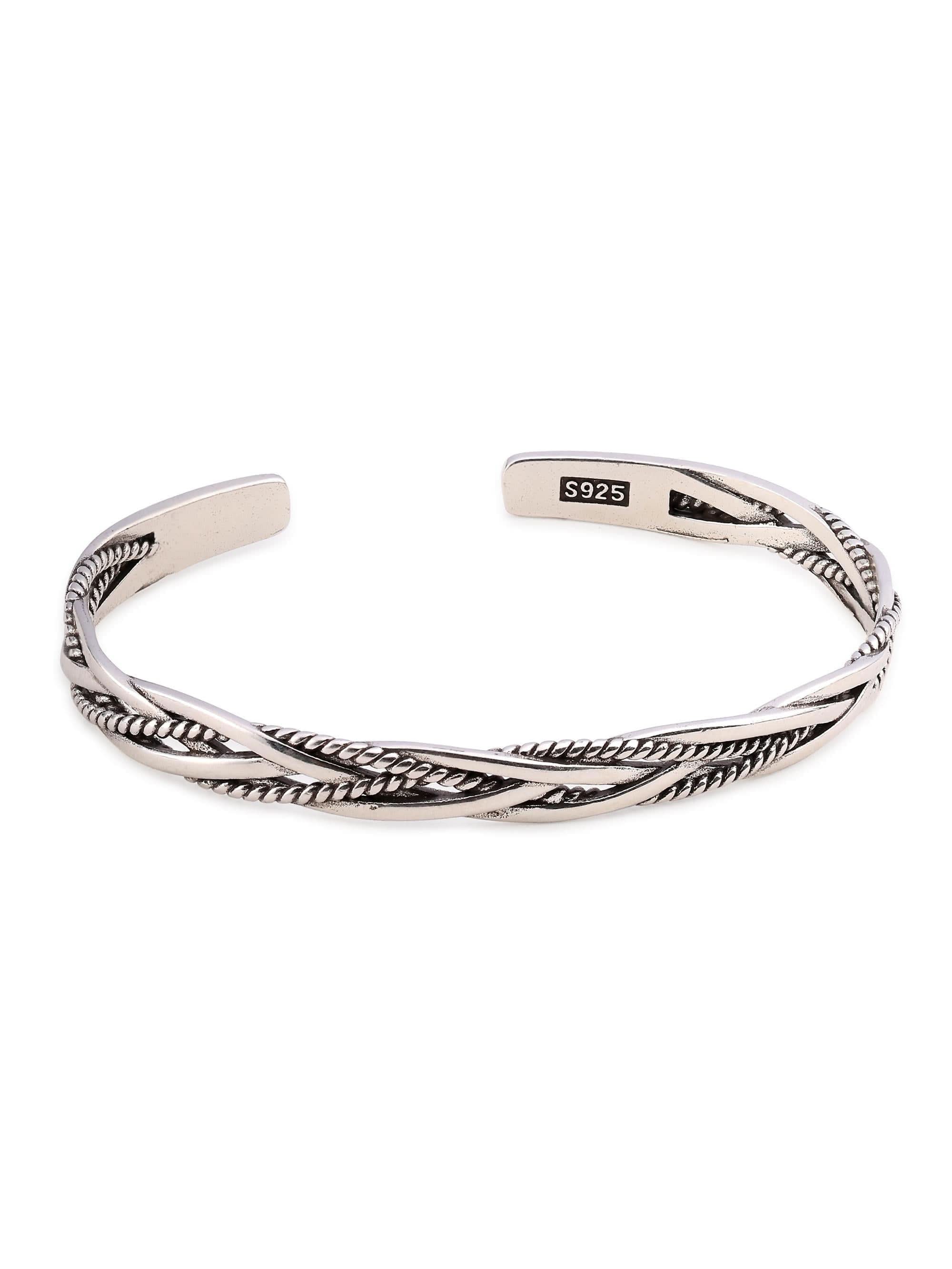 Flat-lay of silver twisted rope cuff bracelet with S925 hallmark