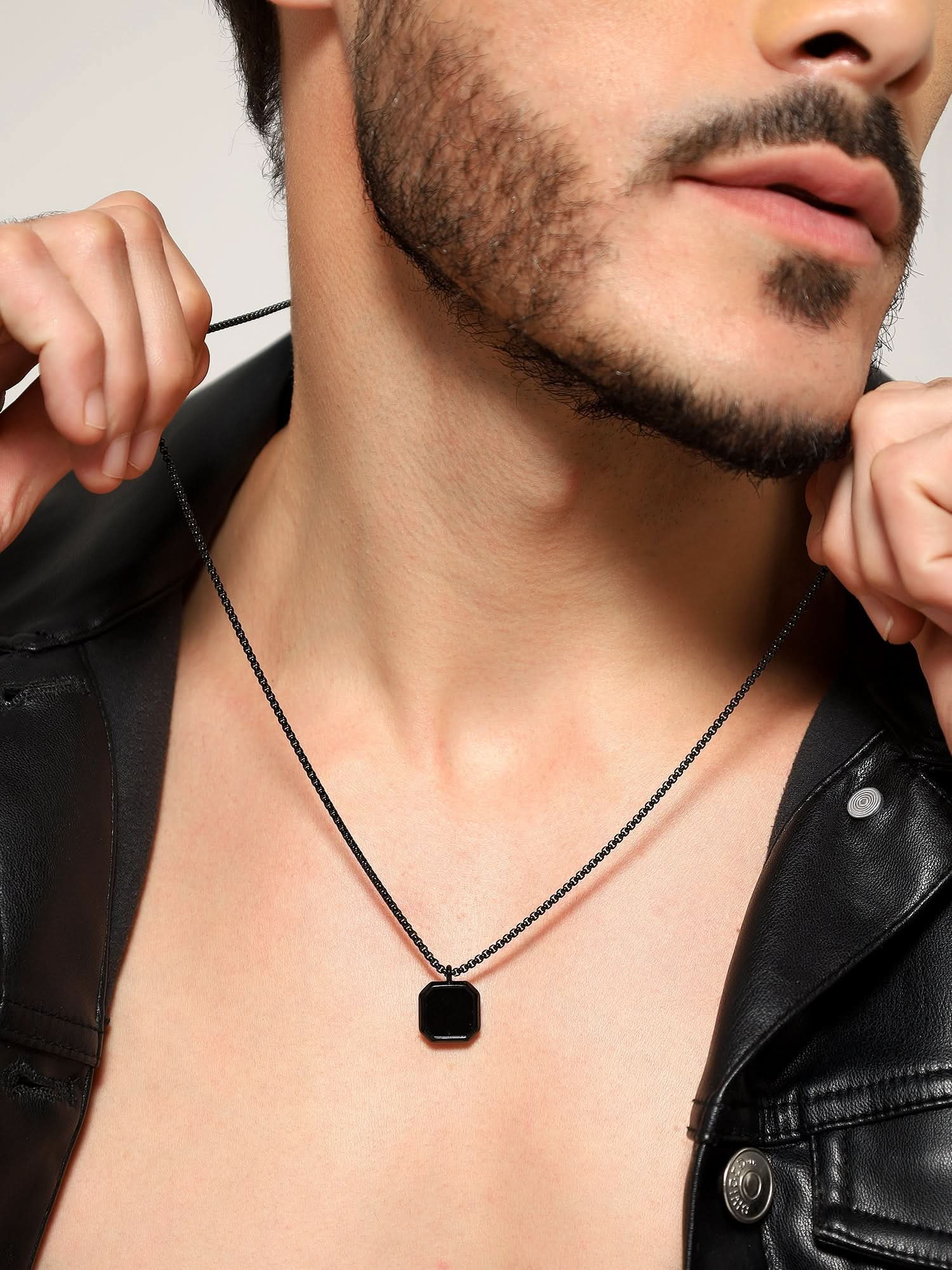 Model wearing Cuban Box Chain Enamel Square Pendant in black — men's black pendant styled on hand