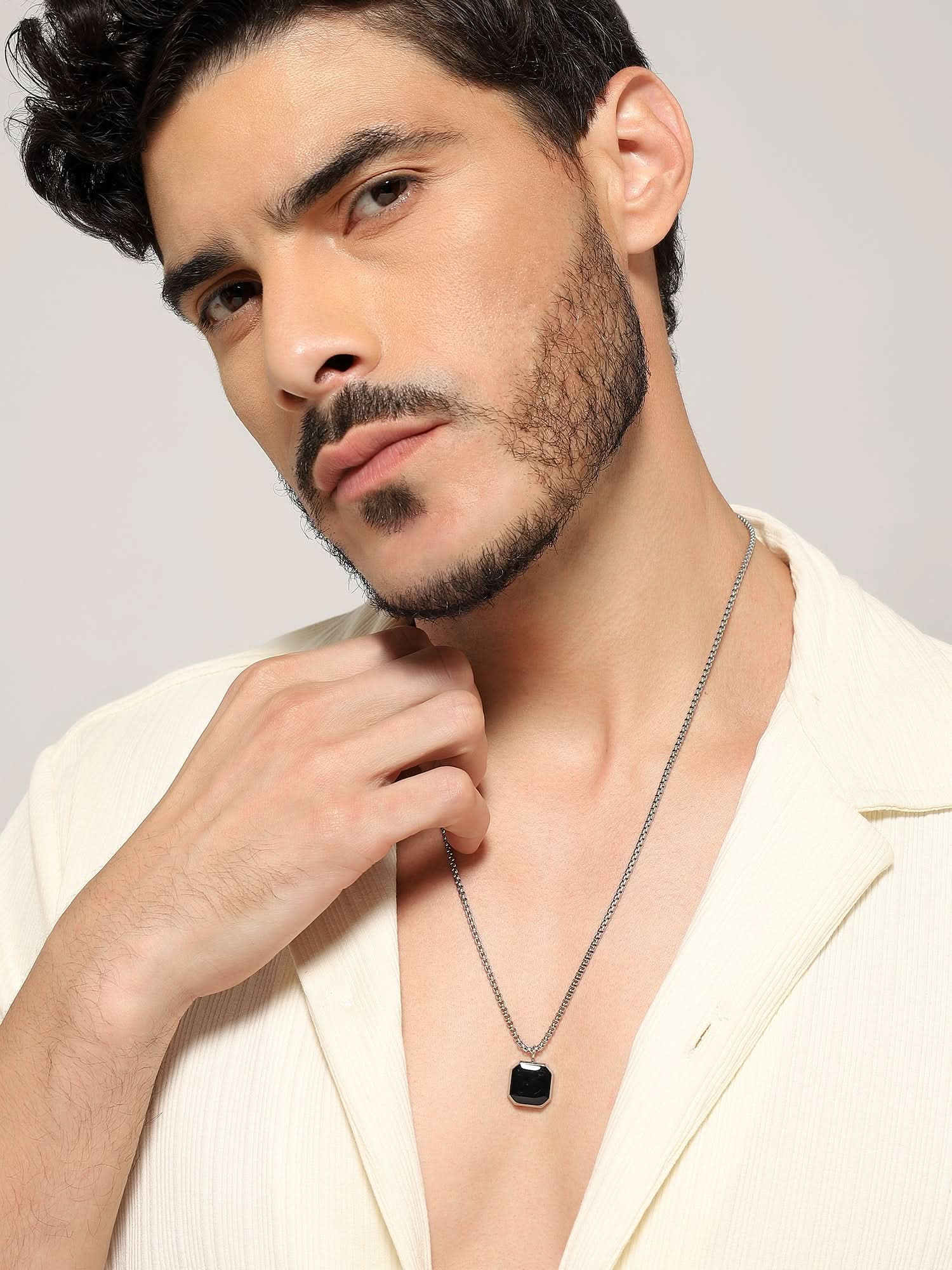 Model wearing Cuban Box Chain Enamel Square Pendant in silver — men's silver pendant styled on hand