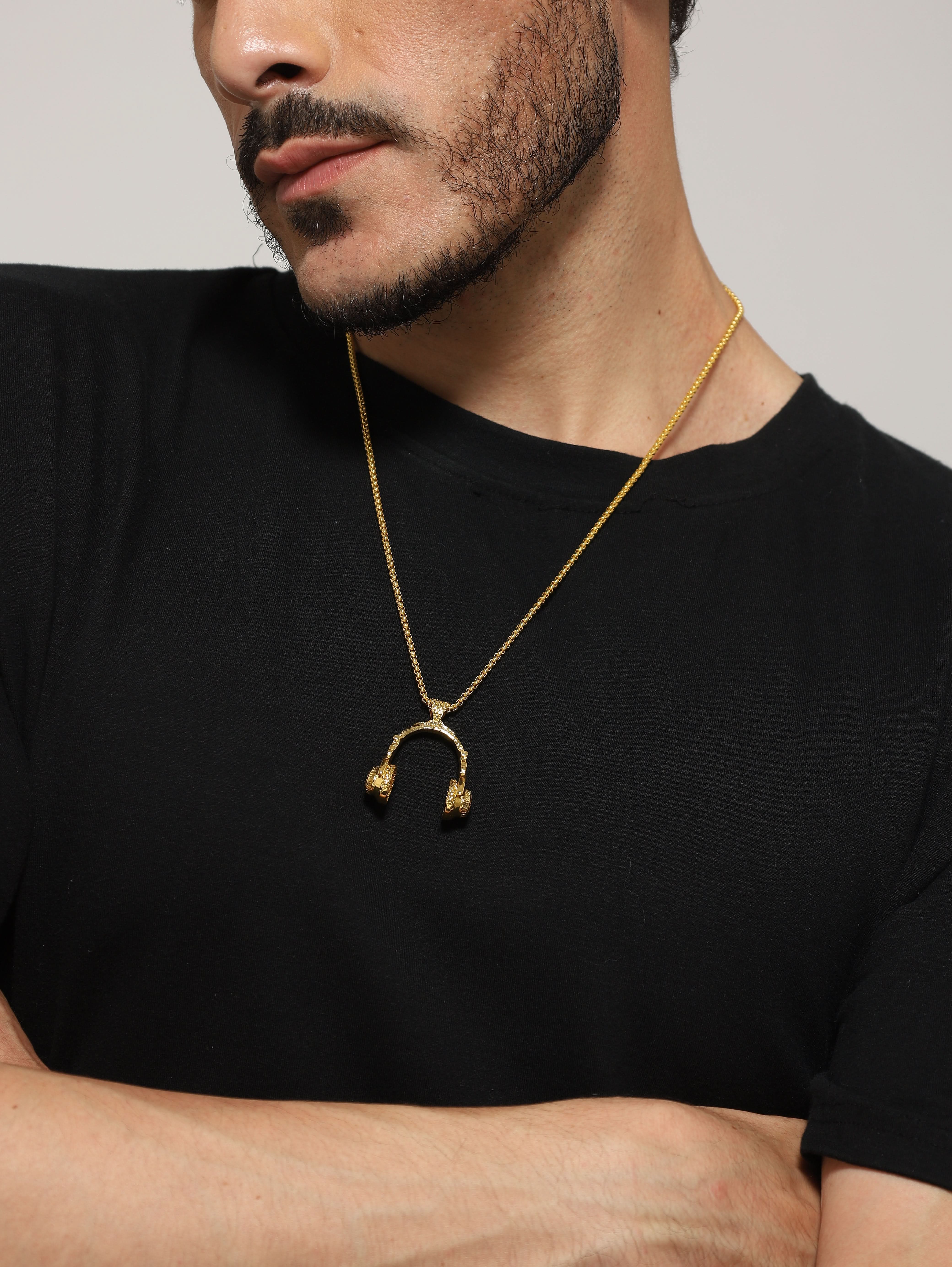 Model wearing DJ Music Phone Pendant in gold — men's gold pendant styled on hand