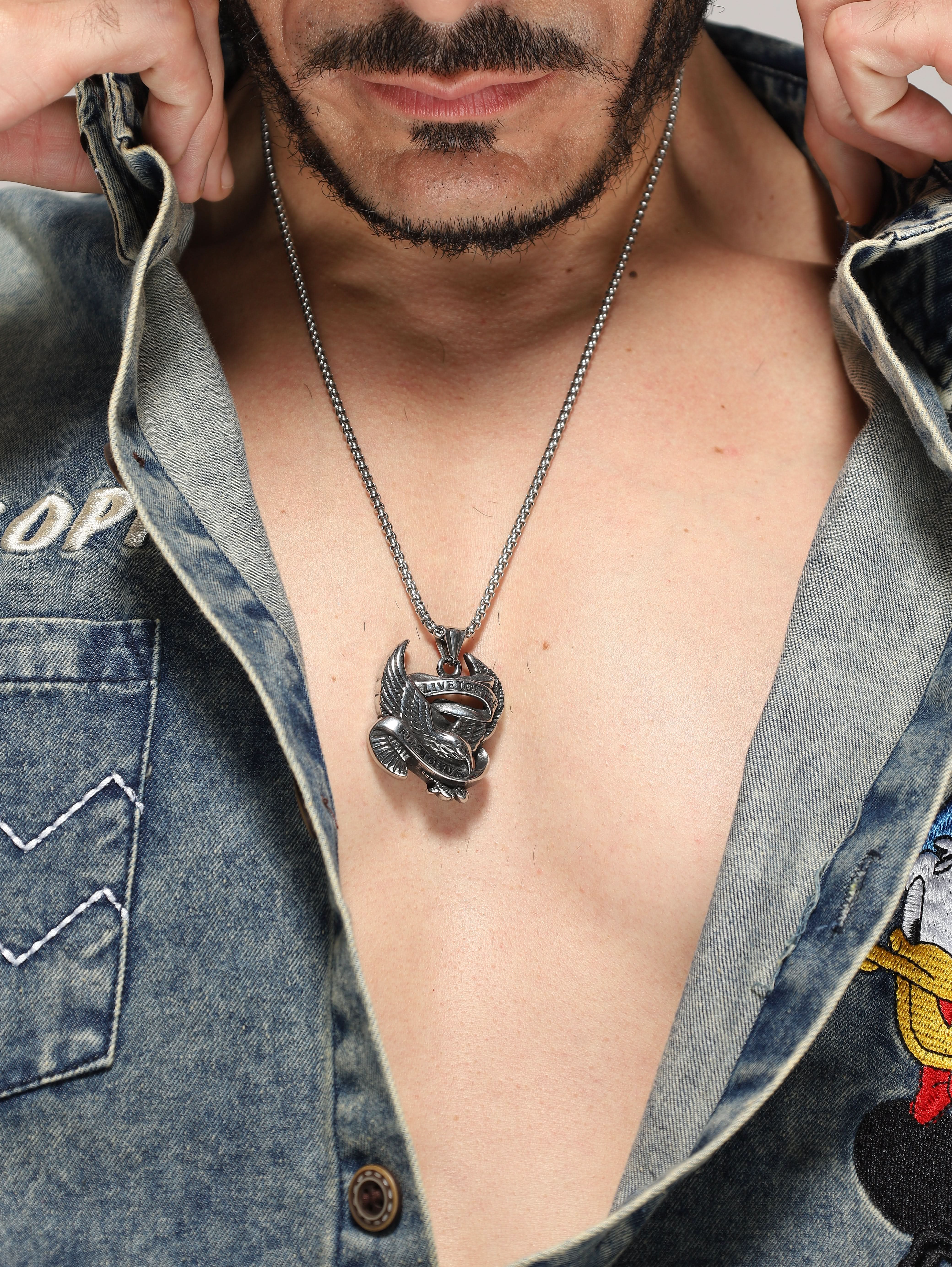 Model wearing Biker Spirit Rider Pendant in silver — men's silver pendant styled on hand