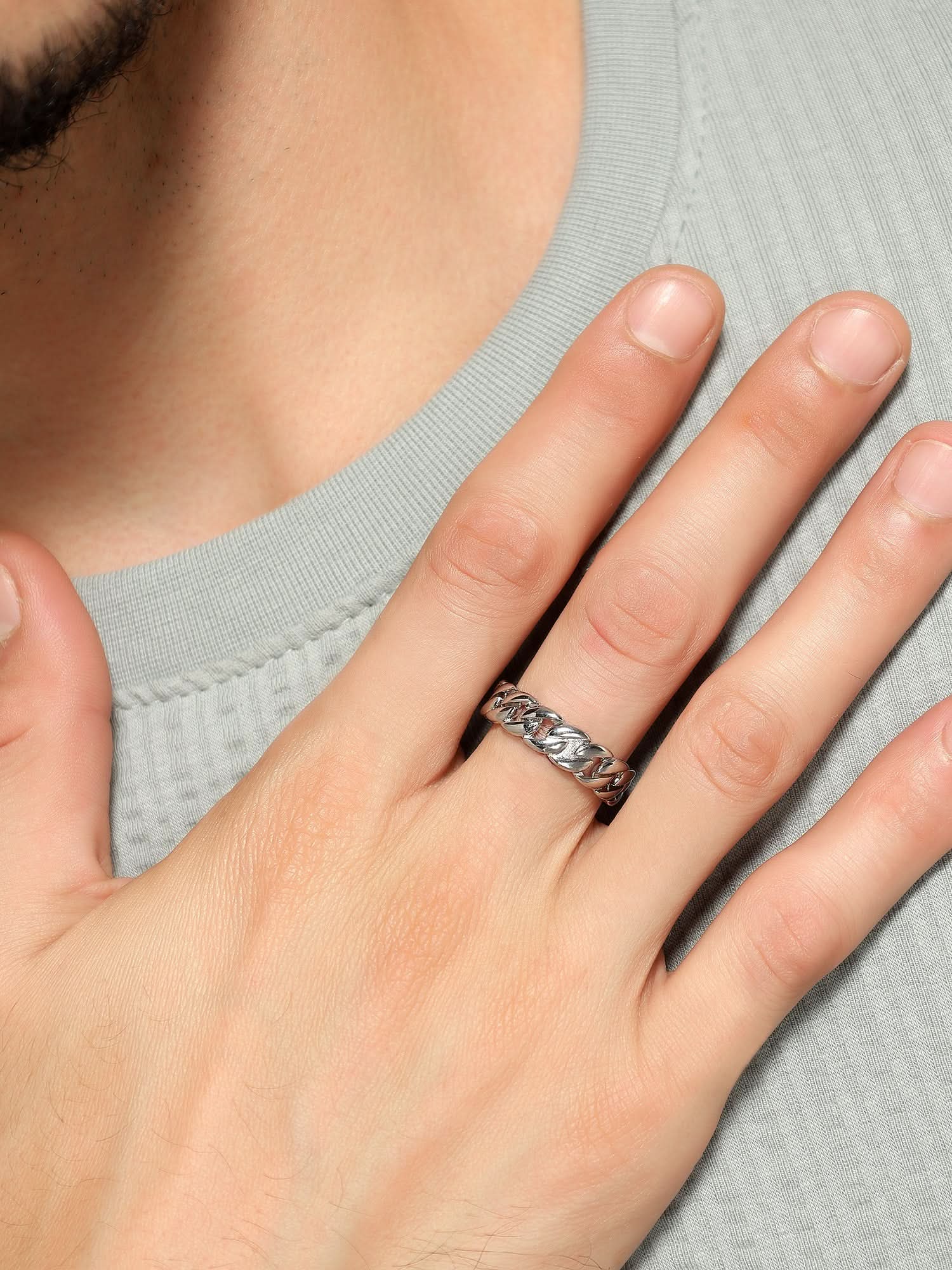 Model wearing Cuban Link Finger Ring in silver — men's silver ring styled on hand