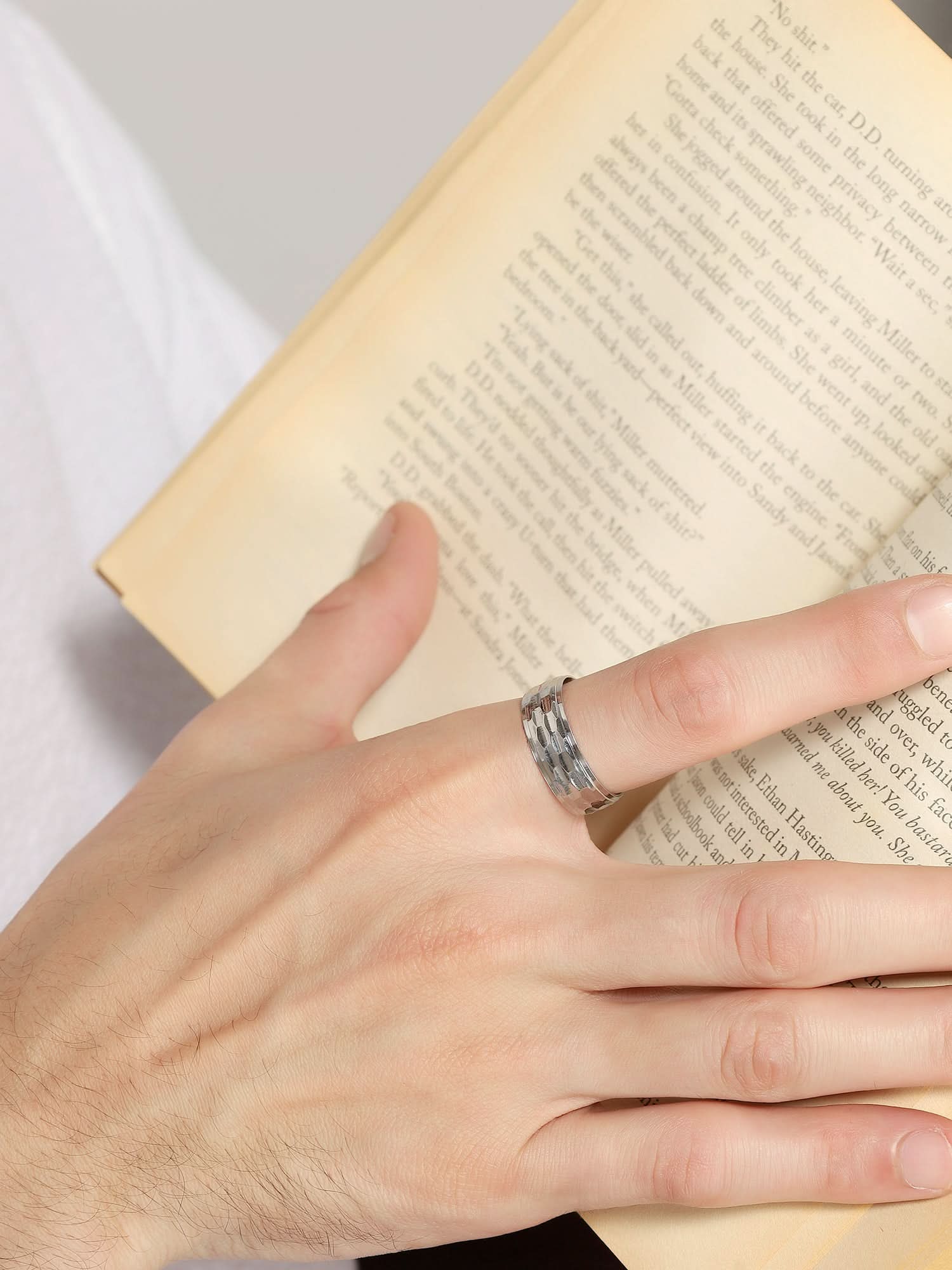 Model wearing Honeycomb Pattern Ring in silver — men's silver ring styled on hand