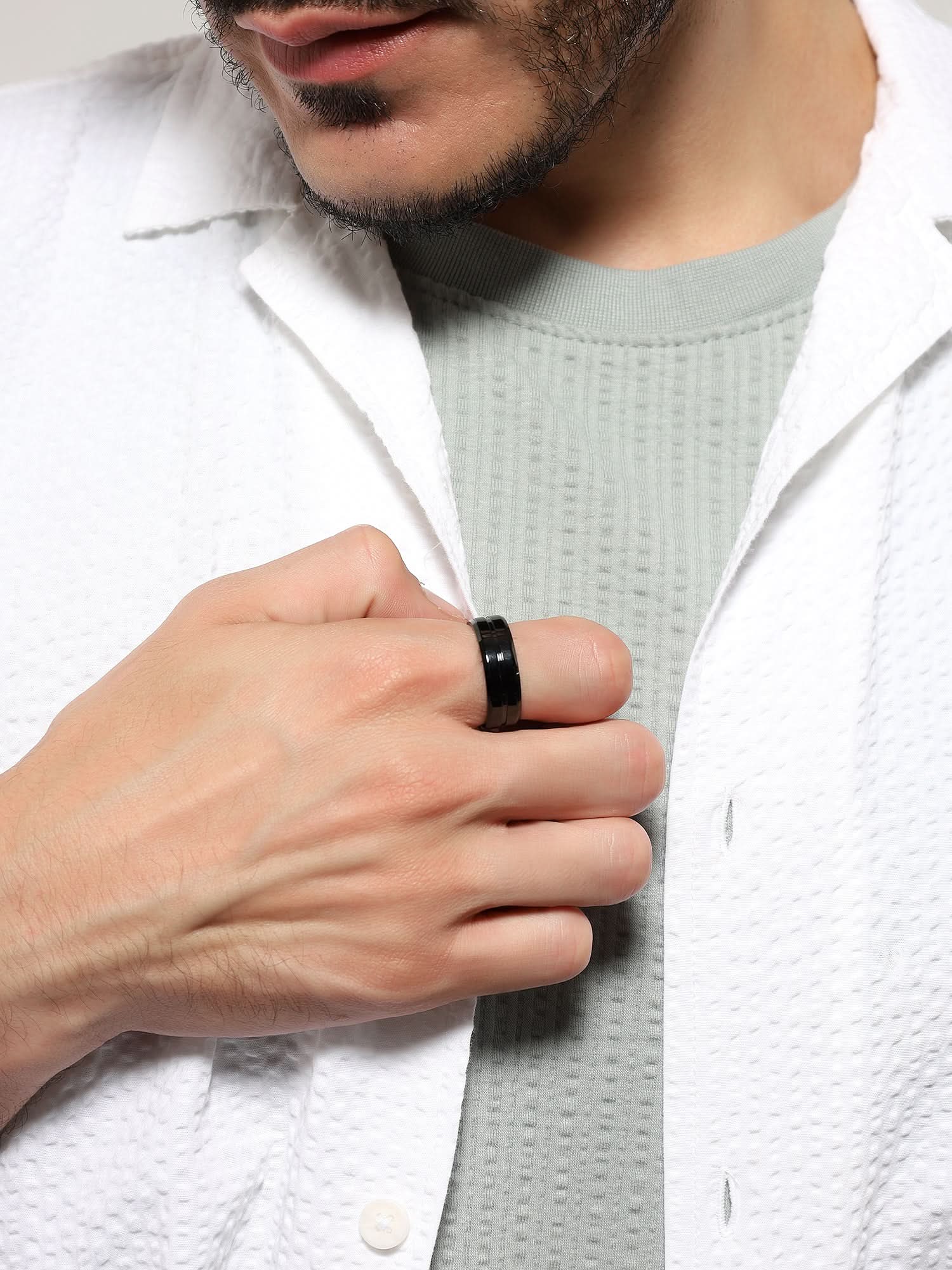 Model wearing Single Slot Ring in black — men's black ring styled on hand
