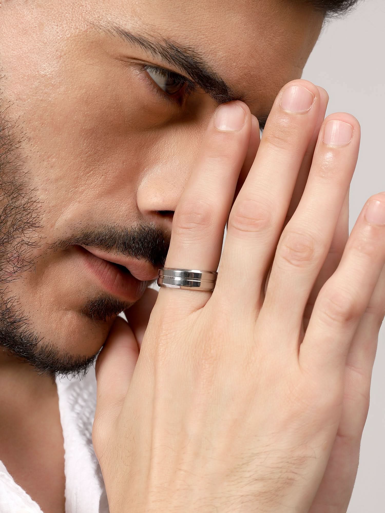 Model wearing Single Slot Ring in silver — men's silver ring styled on hand