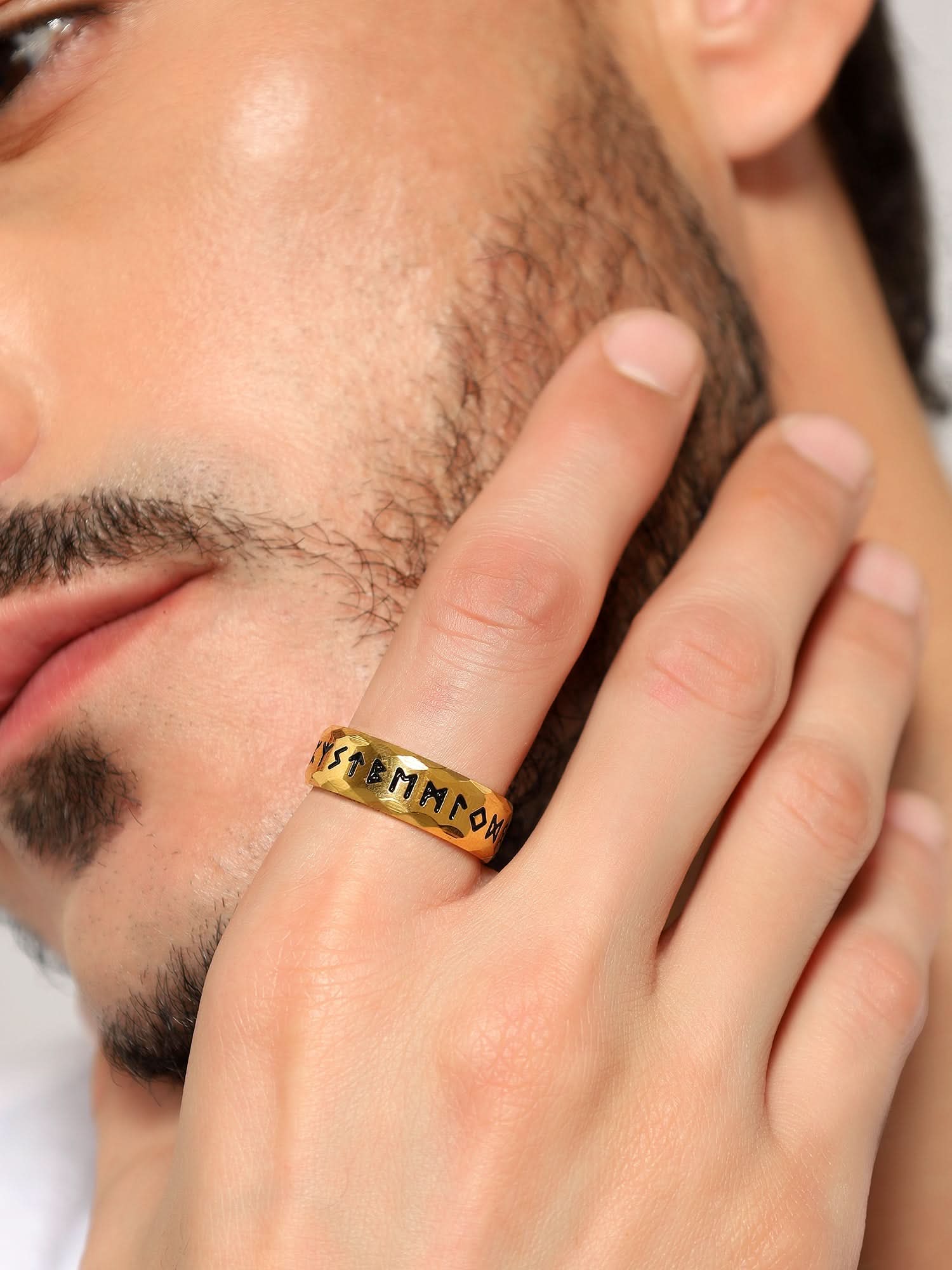Model wearing Ancient Retro Ring in gold — men's gold ring styled on hand
