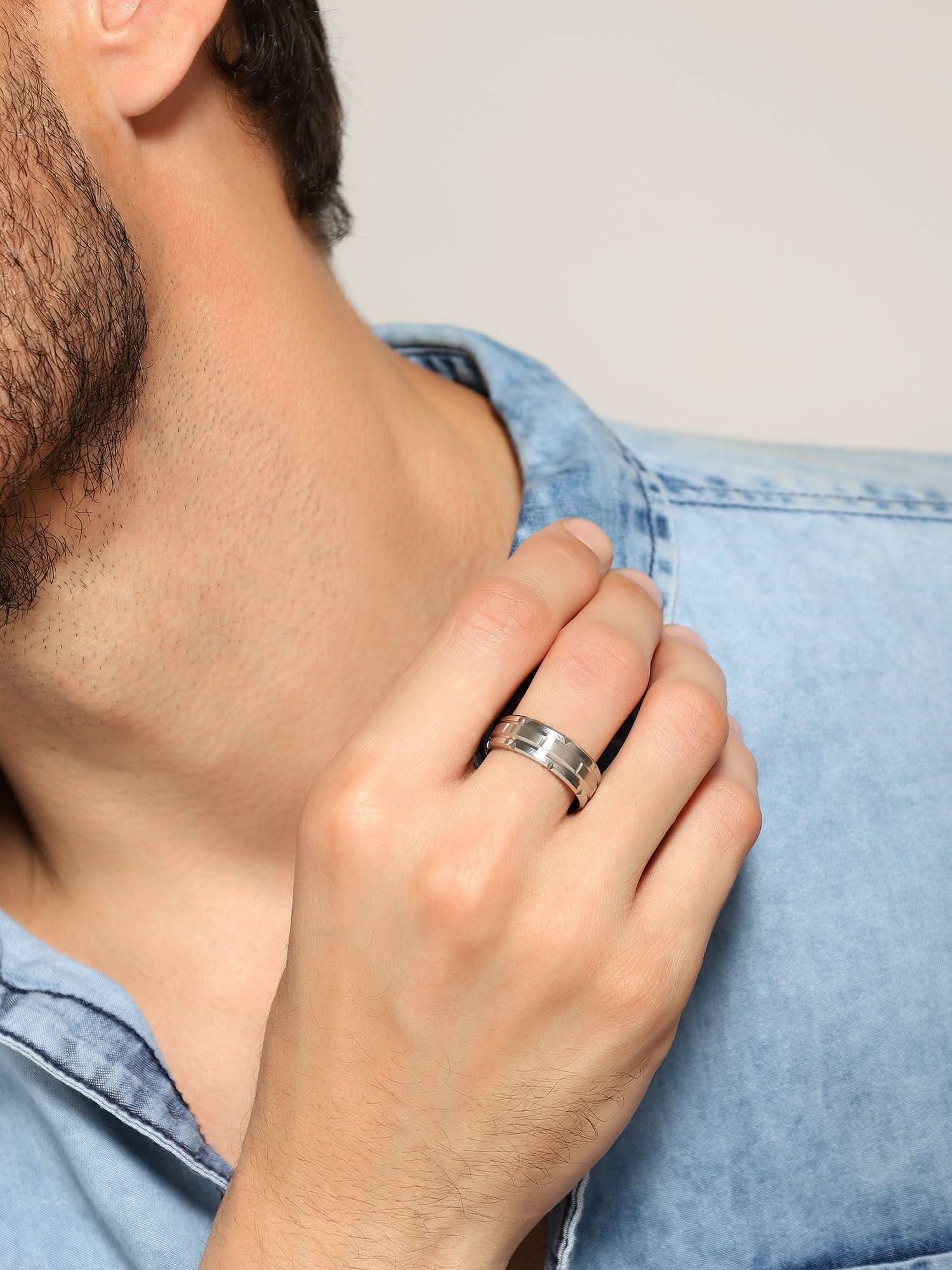 Model wearing Tungsten Pattern Ring in silver — men's silver ring styled on hand