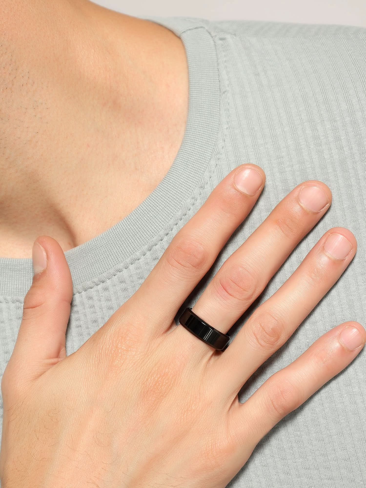 Model wearing Rectangle Signet Ring in black — men's black ring styled on hand