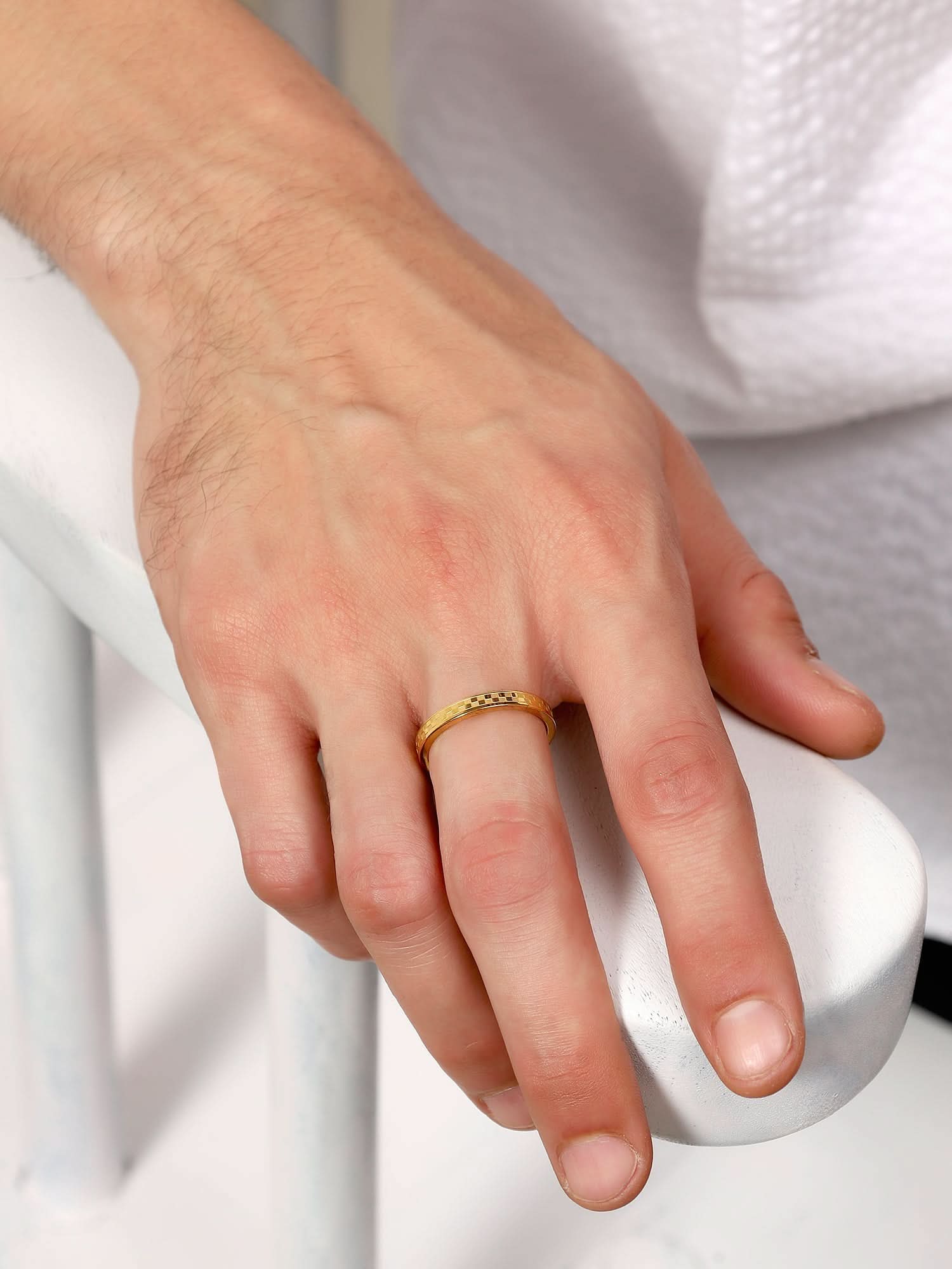 Model wearing Square Designer Ring in gold — men's gold ring styled on hand
