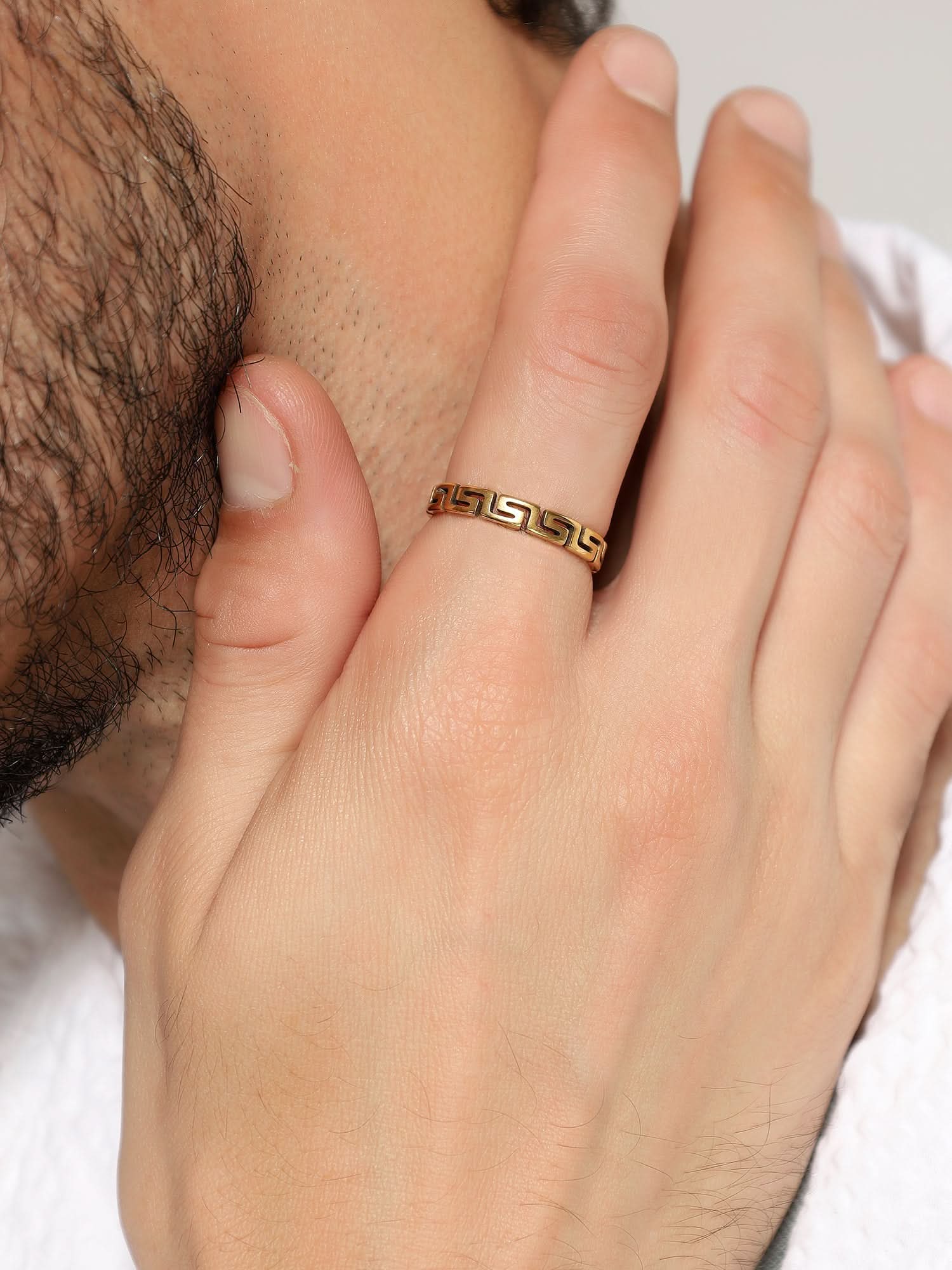 Model wearing Cutting Designer Ring in gold — men's gold ring styled on hand