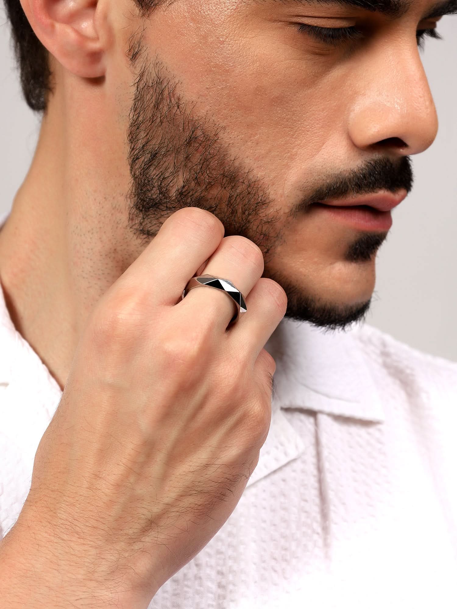 Model wearing Anillos Fashion Couple Ring in silver — men's silver ring styled on hand