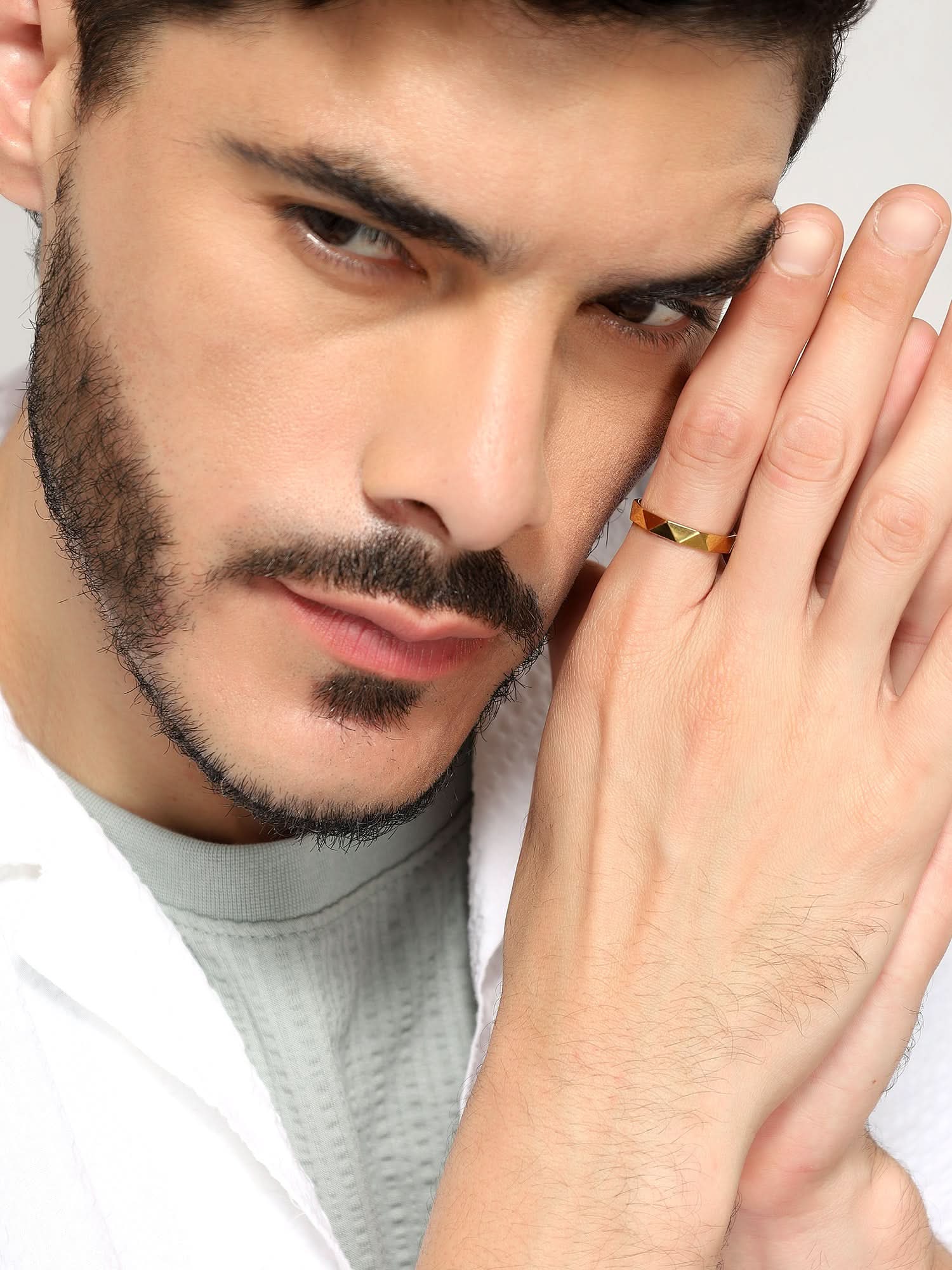 Model wearing Cross Versatile Ring in gold — men's gold ring styled on hand